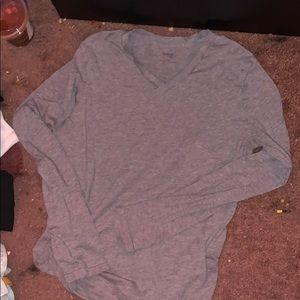 grey long sleeve active wear.